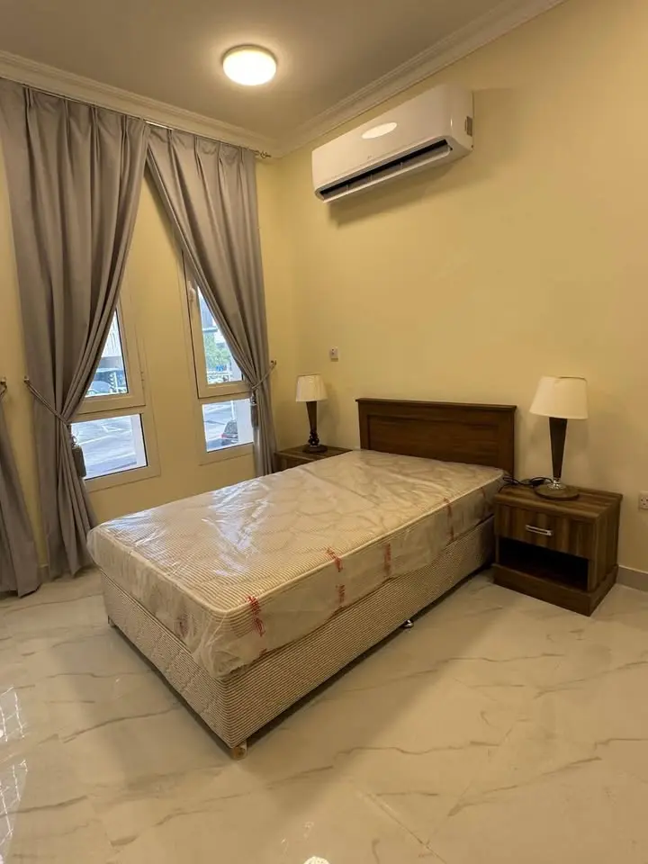 Executive Bachelor Rooms for Rent in Al Mansoura – Fully Furnished
